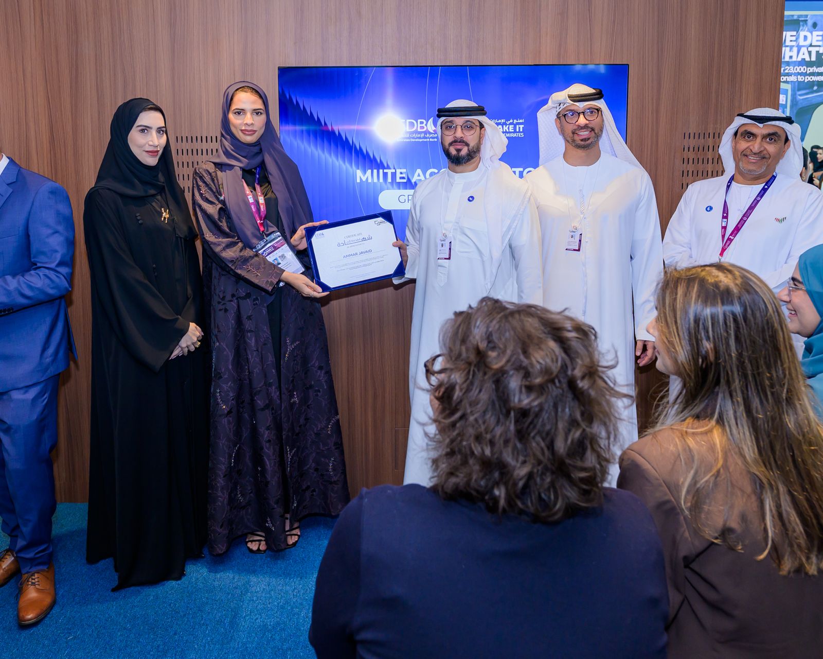 EXO Drones receiving the Make it in the Emirates Accelerator graduation certificate from EDB